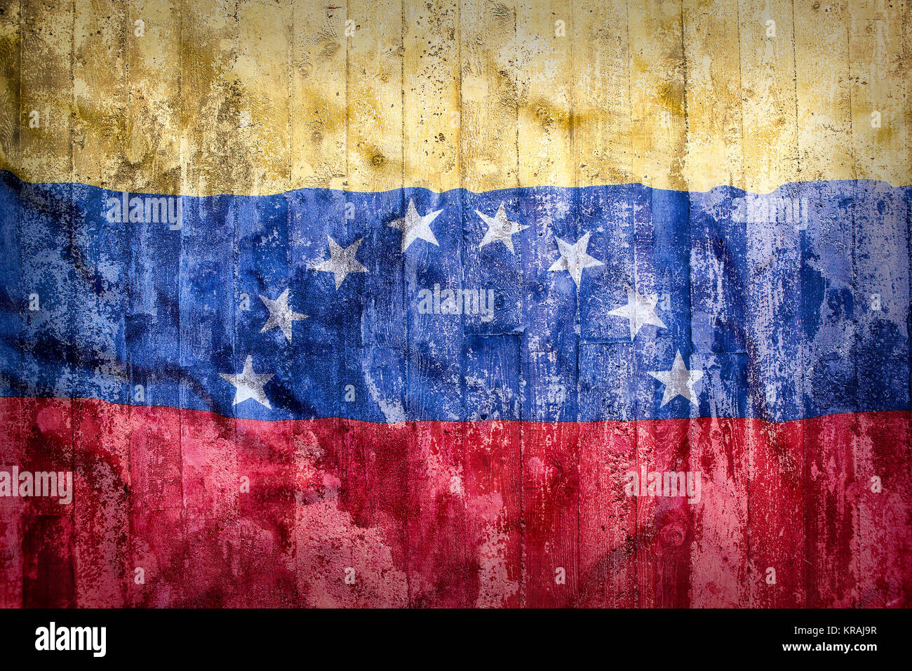 Grunge style du Venezuela drapeau sur un mur de brique pour le fond Banque D'Images