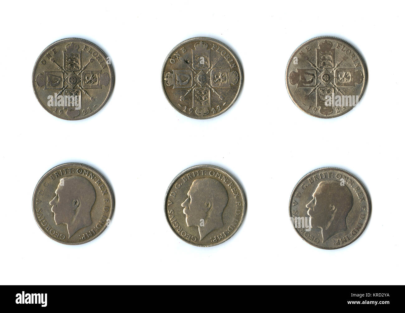 Pièces de monnaie britanniques, trois fleurs de George V. Banque D'Images
