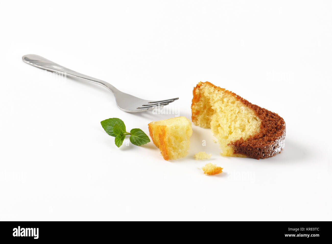 En morceaux de gâteau bundt Banque D'Images