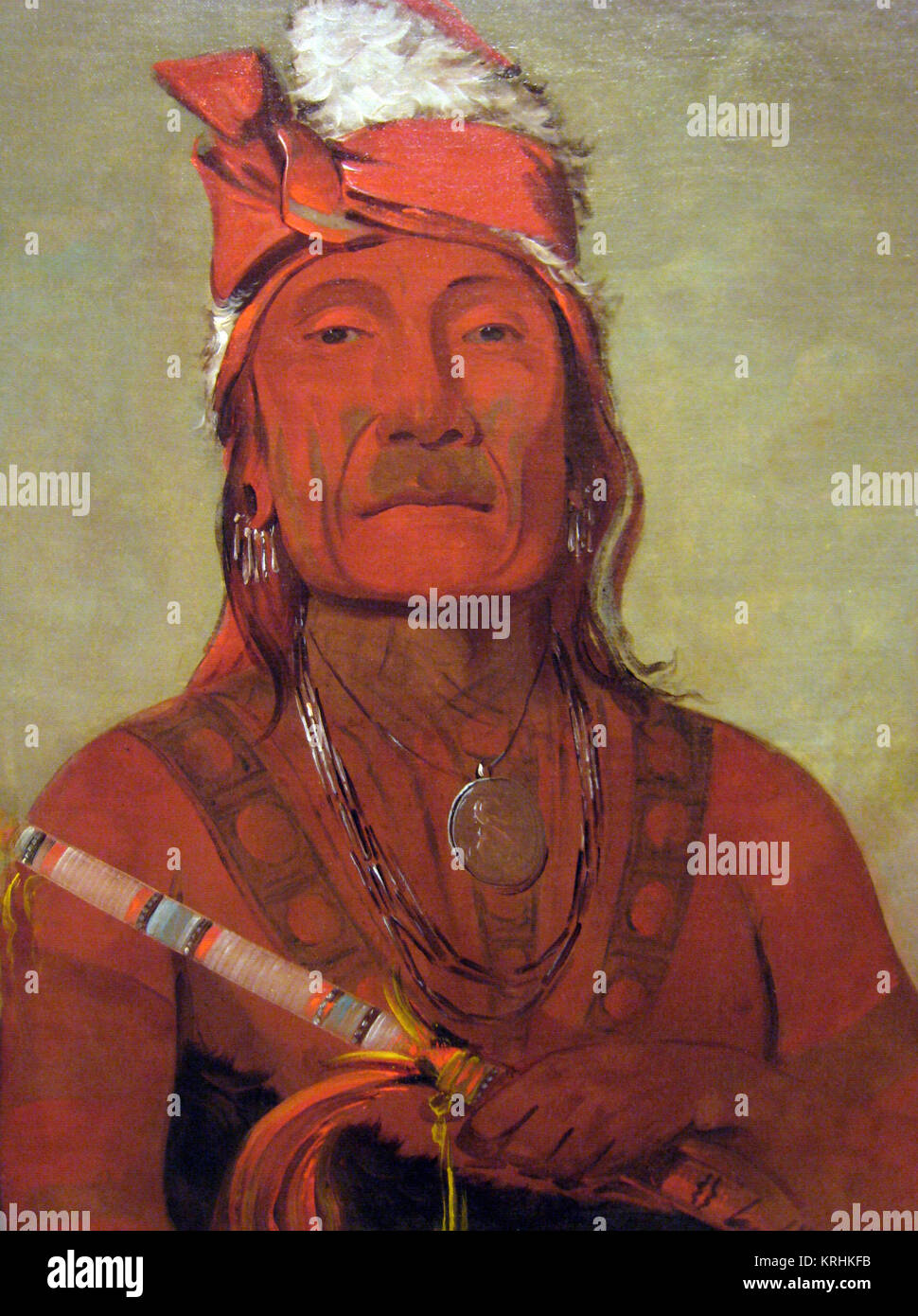 Catlin Native American avec Tomahawk Banque D'Images