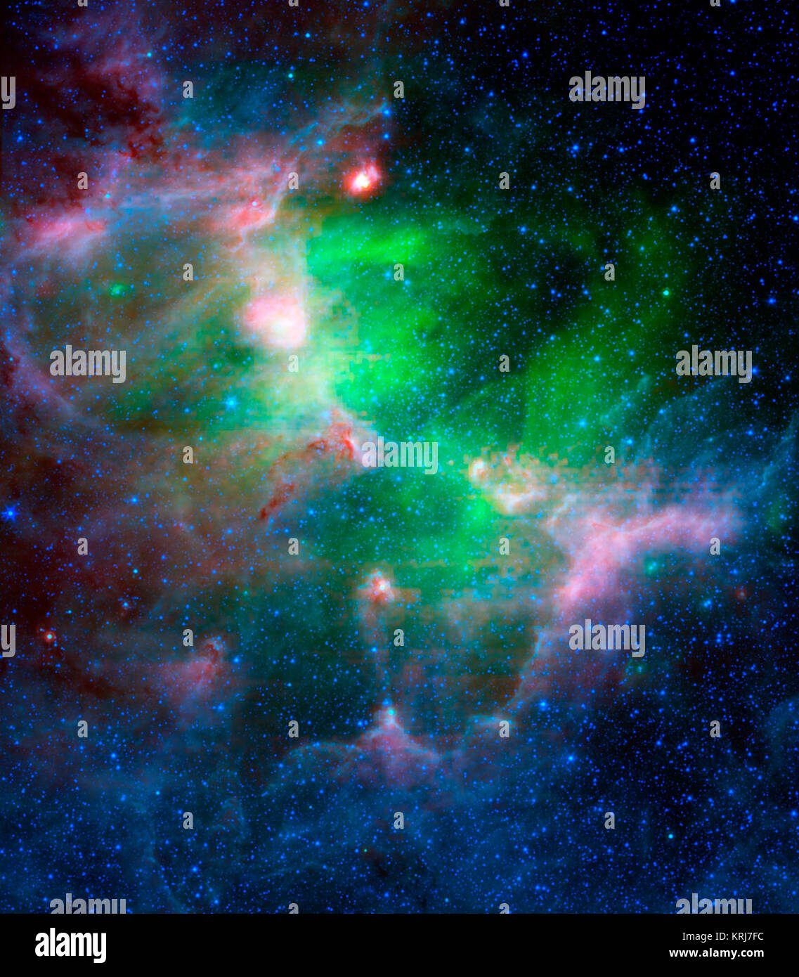 Cette photo infrarouge met en évidence le contraste entre le chaud, la poussière chauffée supernova (vert) et le refroidisseur de la poussière de la Nébuleuse de l'Aigle's dusty star-formant des nuages et des tours (rouge, bleu et violet).L'image comprend plus d'onde infrarouge, et est un composite de la lumière de 4,5 à 8,0 microns (bleu) ; 24 microns (vert) ; et 70 microns (rouge). Vue dans l'infrarouge de la Nébuleuse de l'Aigle Banque D'Images