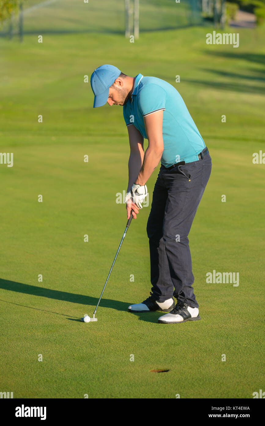 Man Playing Golf Banque D'Images