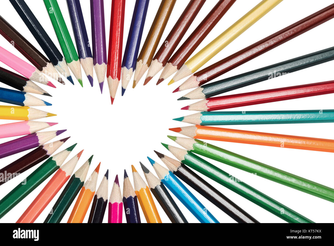 Set de crayons de couleurs alignées dans un cercle en forme de cœur isolé sur fond blanc Banque D'Images Set de crayons de couleurs alignées dans un cercle en forme de cœur isolé sur fond blanc Banque D'Images