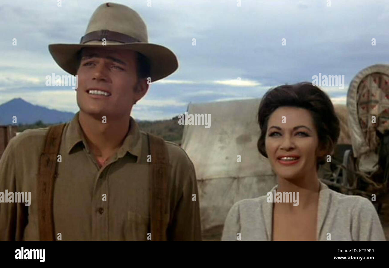Scène tirée du film McLintock !, sorti en 1963, avec les acteurs Patrick Wayne et Yvonne de Carlo. Le film est une comédie occidentale réalisée par Andrew V. McLaglen. Banque D'Images