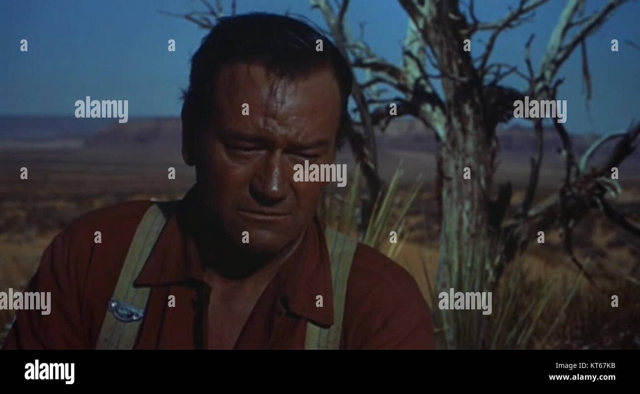 Capture d'écran du film occidental de 1956 'The Searchers', réalisé par John Ford, mettant en vedette John Wayne. Banque D'Images