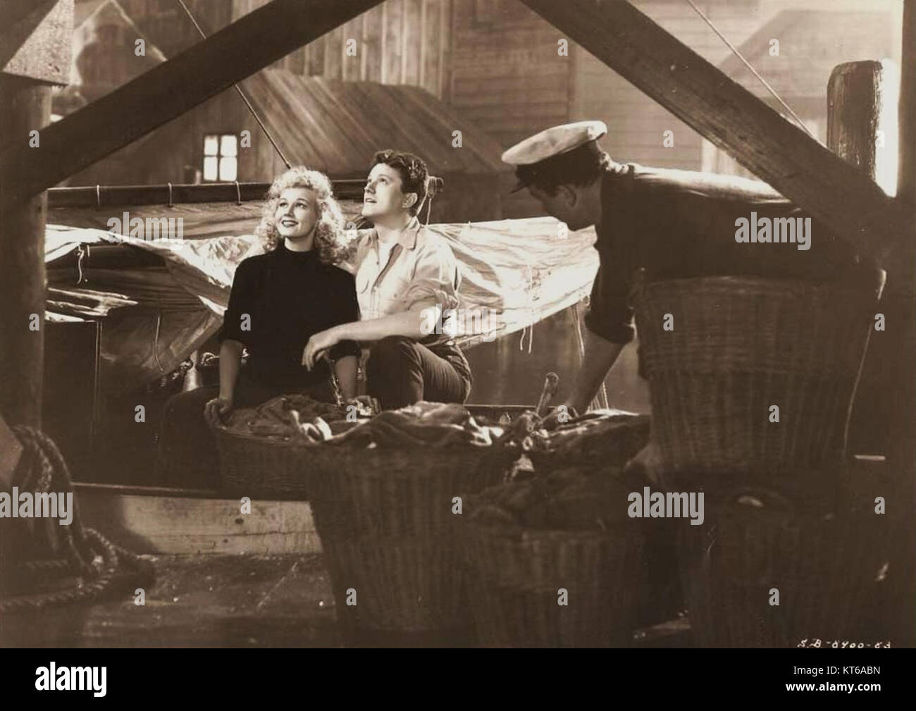 Virginia Mayo et Michael O'Shea ont joué dans le film 'Jack London', qui décrit la vie du célèbre écrivain. Le film dramatise des moments clés de sa vie et de sa carrière, mettant en évidence son ascension vers la renommée et ses expériences en tant qu'aventurier. Banque D'Images