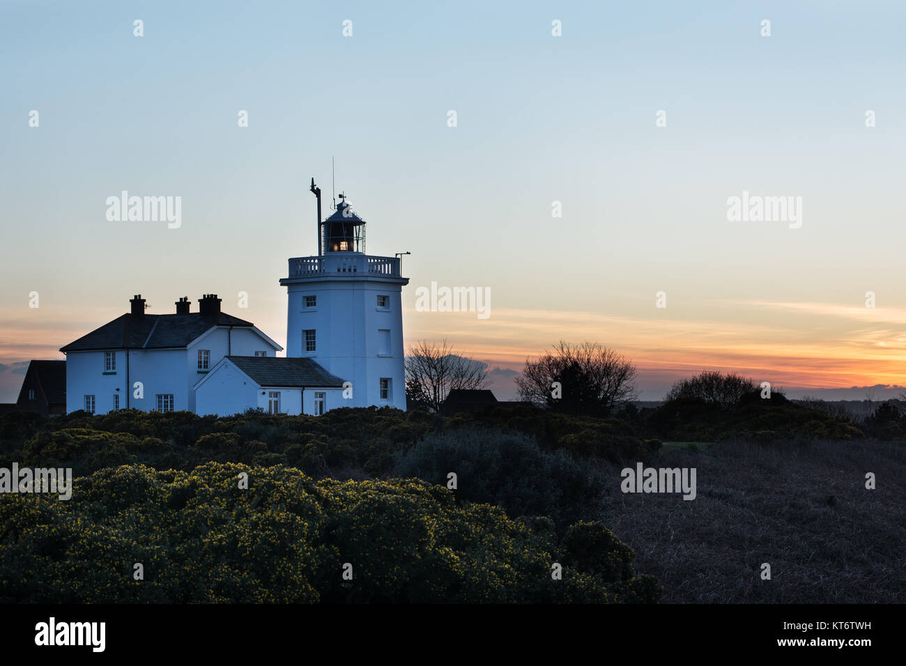 Coucher de soleil sur le phare de Cromer Banque D'Images