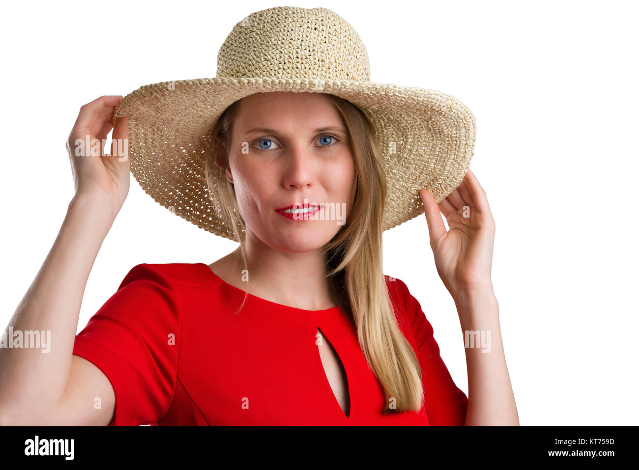 Femme blonde en robe rouge avec chapeau de paille,isolated on white Banque D'Images