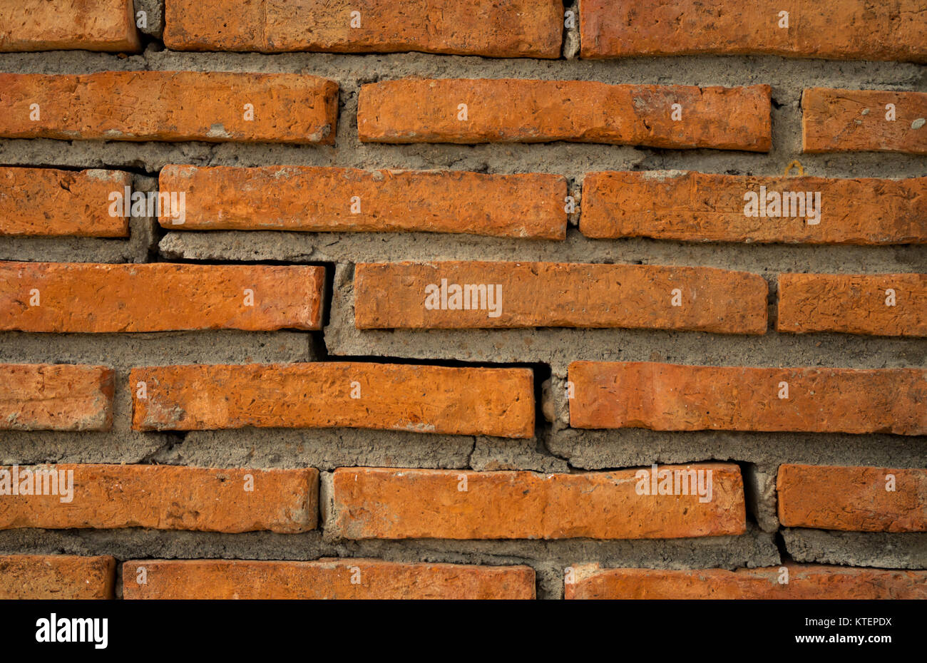 Mur de brique Orange texture background with copy space pour le texte. Banque D'Images