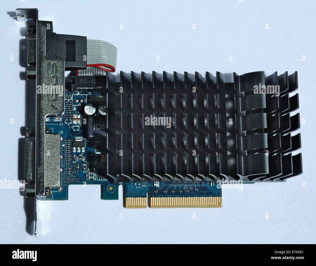 L'Asus GT730 SL 2GD3 BRK est un modèle de carte graphique, connu pour sa fiabilité et son prix abordable, conçu pour les utilisateurs soucieux de leur budget qui ont besoin de performances graphiques décentes. Banque D'Images