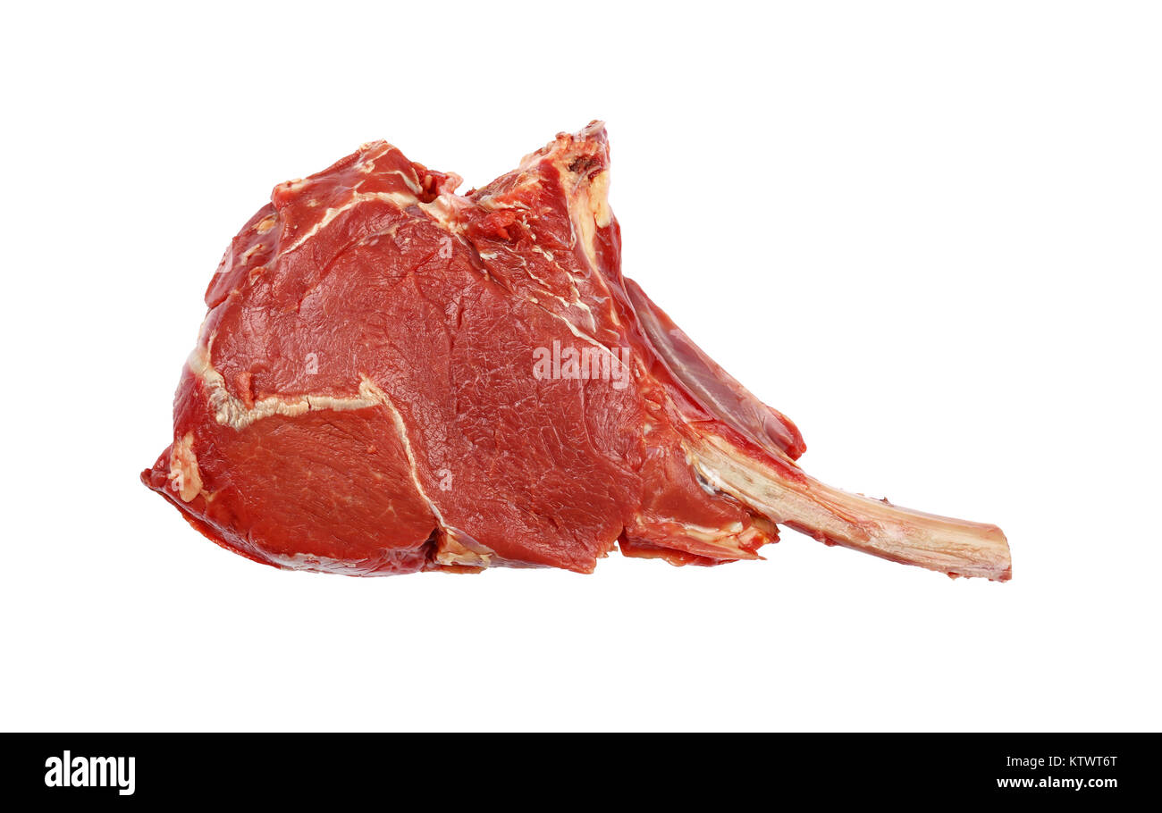 Close up one raw Tomahawk Ribeye Steak de boeuf avec os thoracique isolé sur fond blanc, augmentation de la vue supérieure, juste au-dessus Banque D'Images