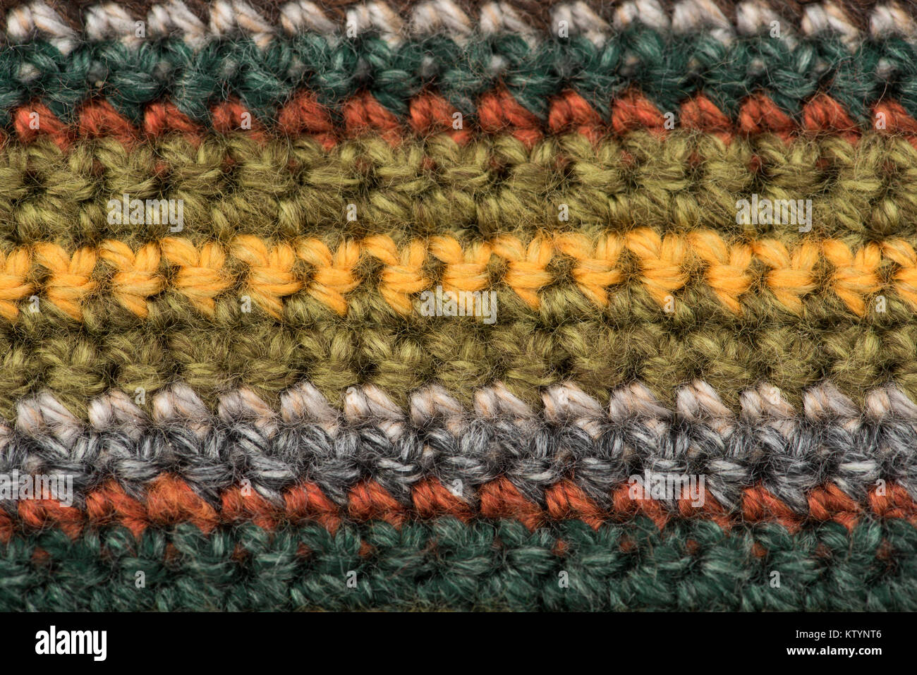 Détails d'une écharpe tricoté avec des tons clairs. Banque D'Images