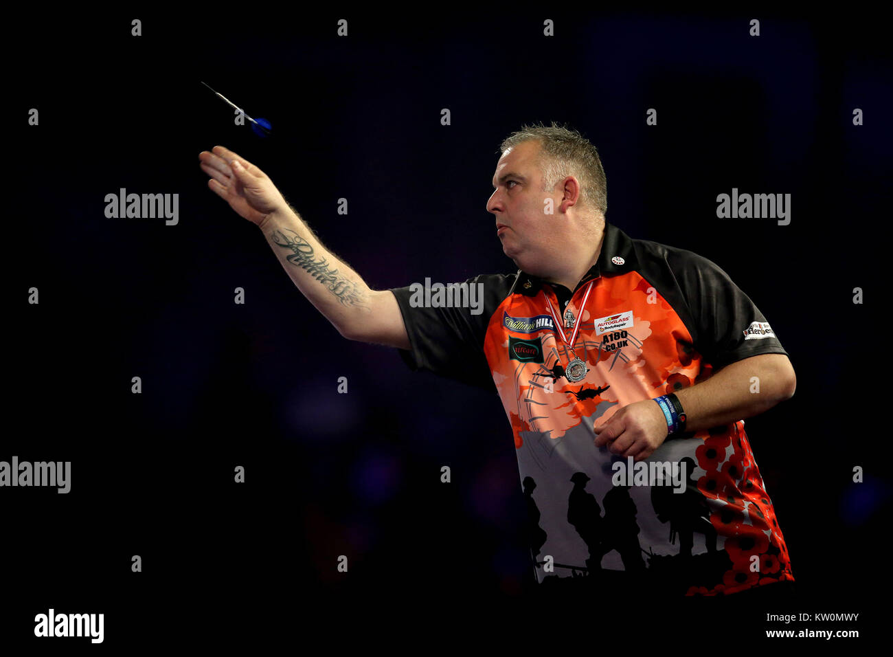 James Richardson en action pendant douze jours de la William Hill World Darts Championship à Alexandra Palace, Londres. Banque D'Images