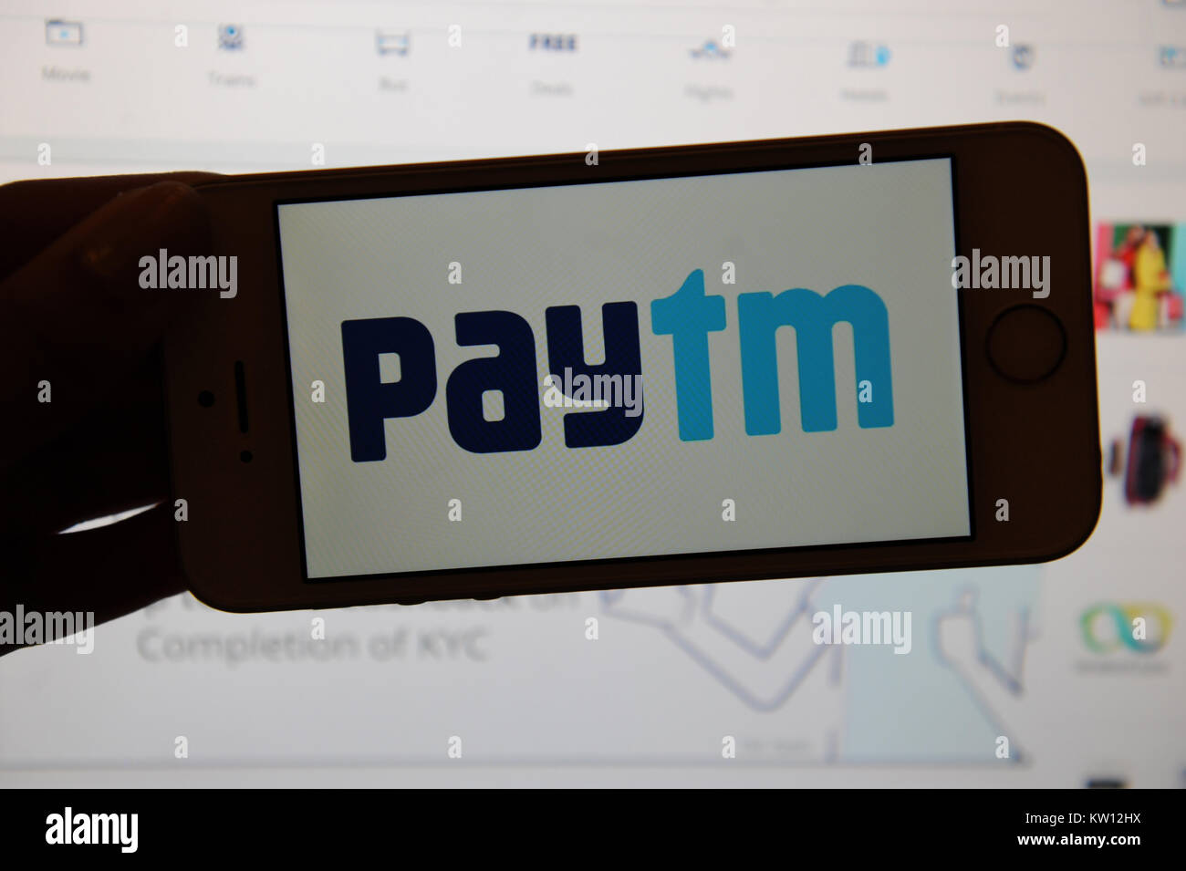 Paytm logo sur un téléphone que sur un écran d'ordinateur Banque D'Images