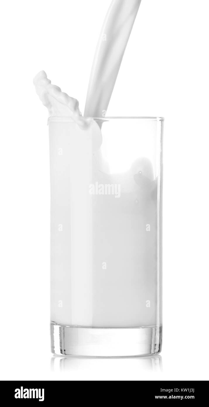 Verser un verre de lait Banque D'Images