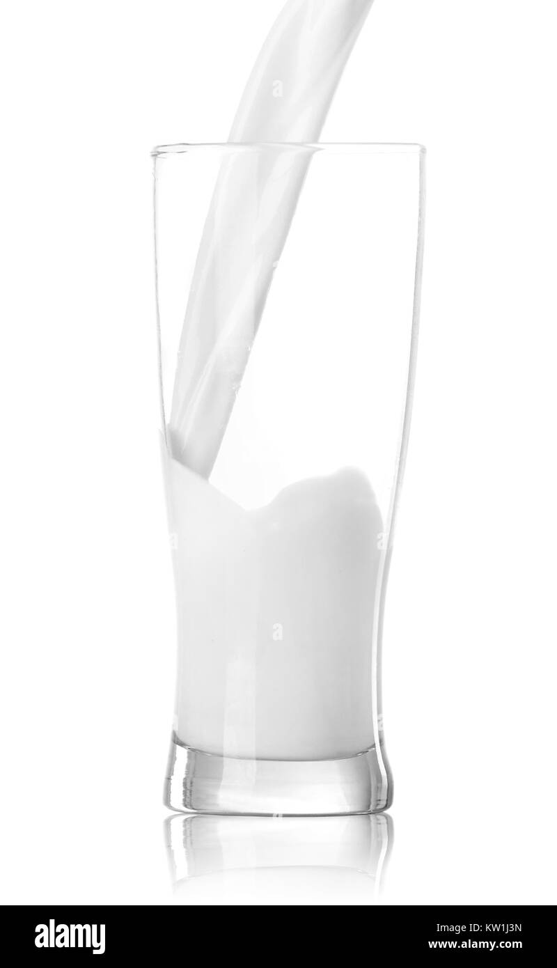 Verser un verre de lait Banque D'Images