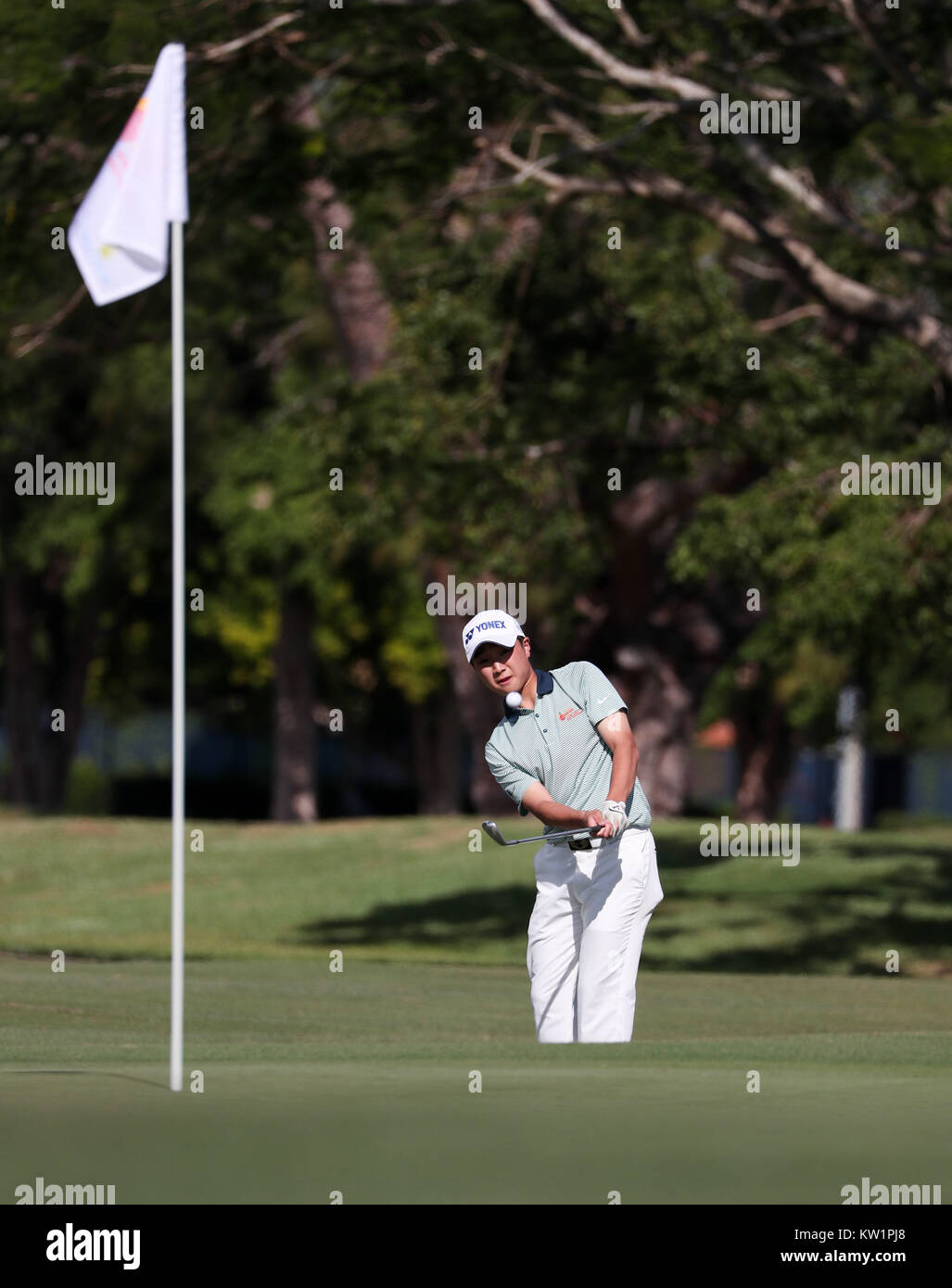 Coral Gables, en Floride, aux Etats-Unis. 28 Dec, 2017. Hirata Kensei (Japon) joue son tir à la 54ème International Junior Orange Bowl Golf Championship au Biltmore à Coral Gables, en Floride. Mario Houben/CSM/Alamy Live News Banque D'Images