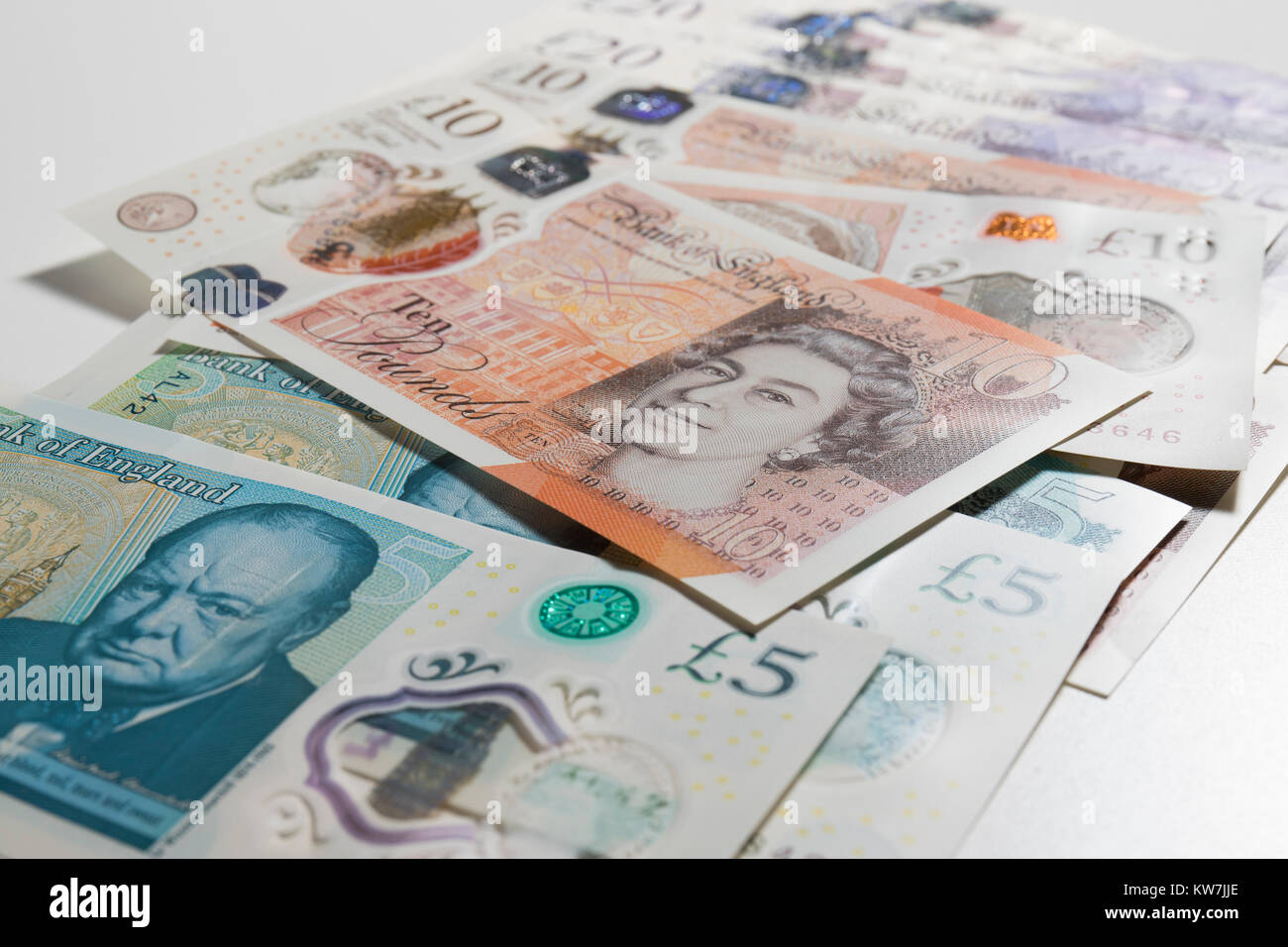 Angle de vue 3/4 Pound note disposés au hasard. Banque D'Images