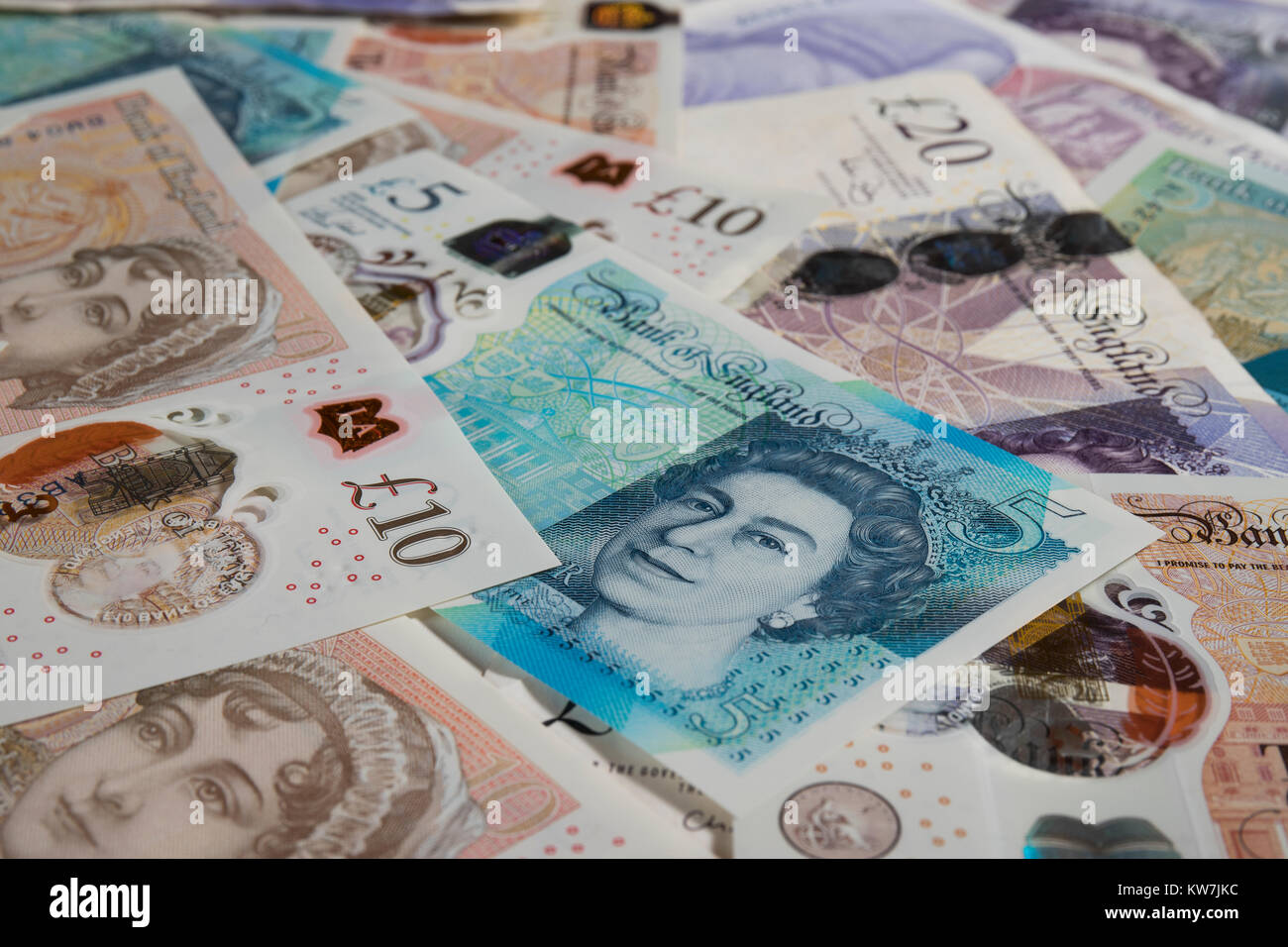 Angle de vue 3/4 Pound note disposés au hasard. Banque D'Images