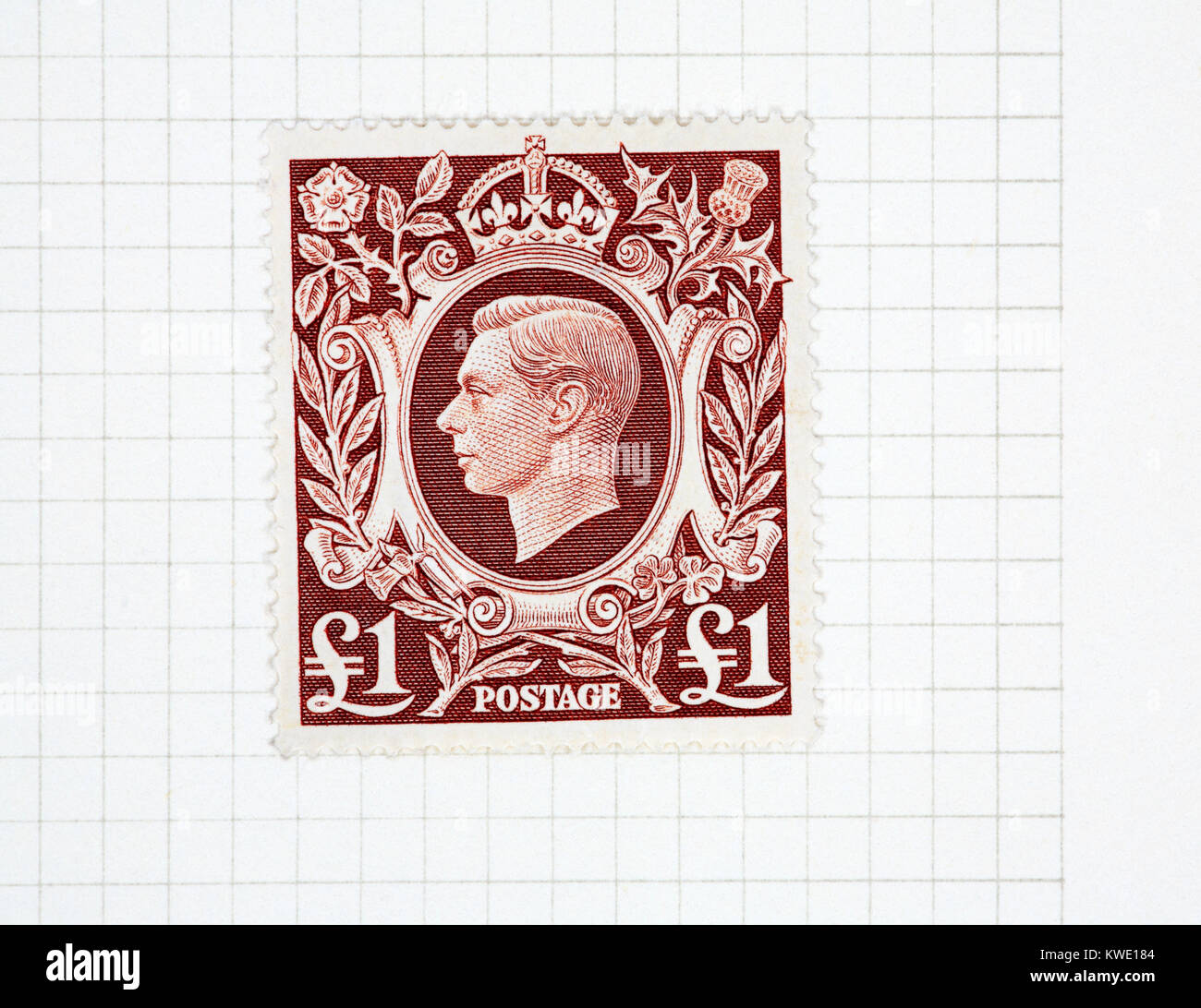 Une monnaie royale Le roi George VI €1 brown stamp de 1939-48 question à partir d'une collection de timbres britanniques. Banque D'Images