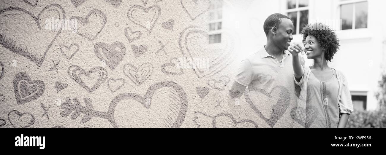 Couple avec l'amour de la Saint Valentin coeur de transition et la maison Banque D'Images