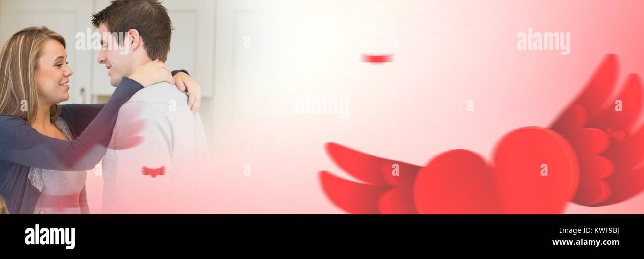 Couple avec l'amour de la Saint Valentin de transition de coeurs volants Banque D'Images