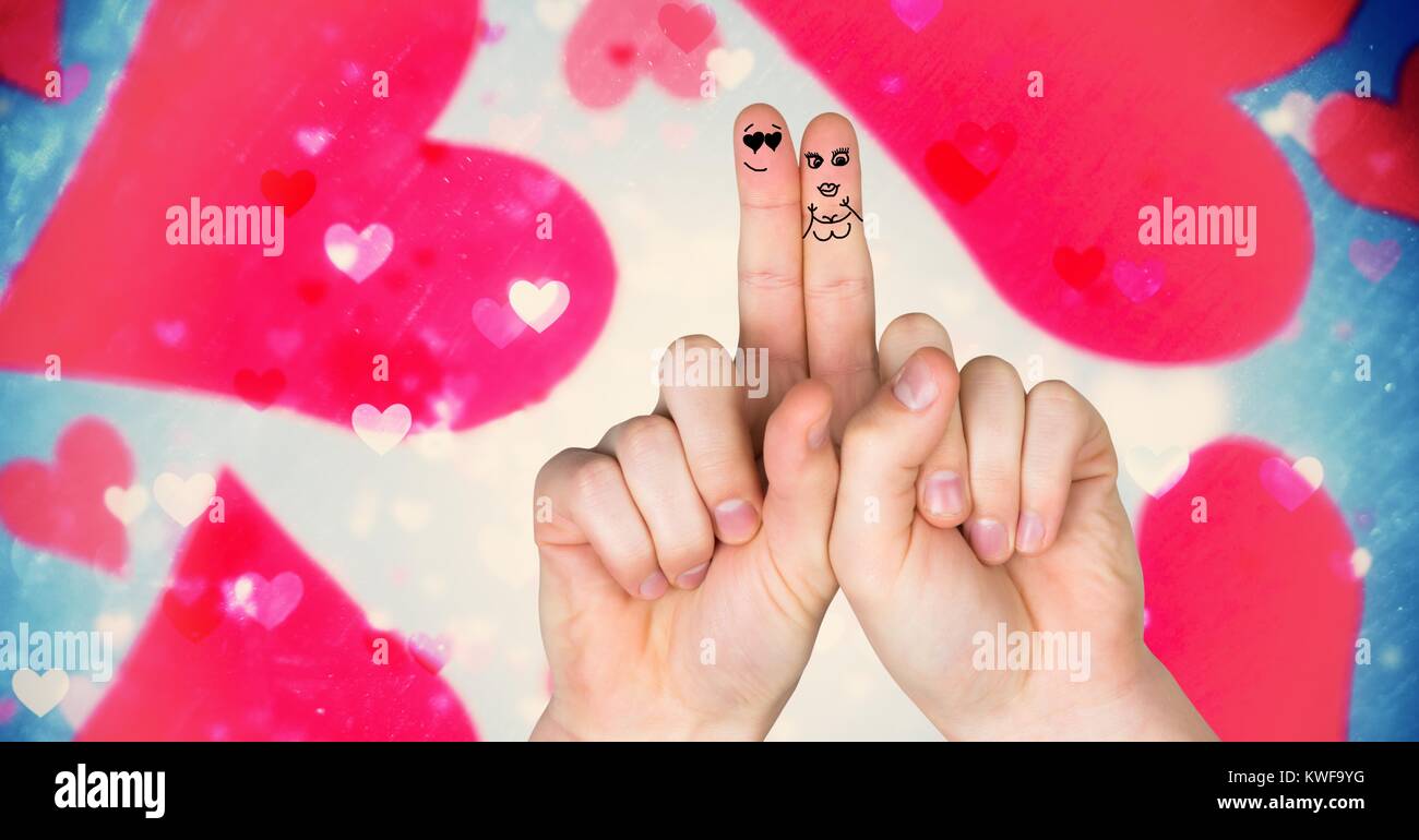 Les doigts de la Saint-Valentin adorent le couple et les coeurs flottants magiques Banque D'Images