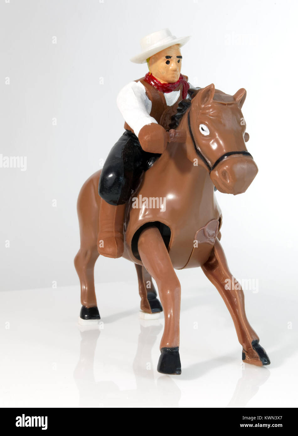 Cowboy sur cheval jouet d'enroulement. Banque D'Images