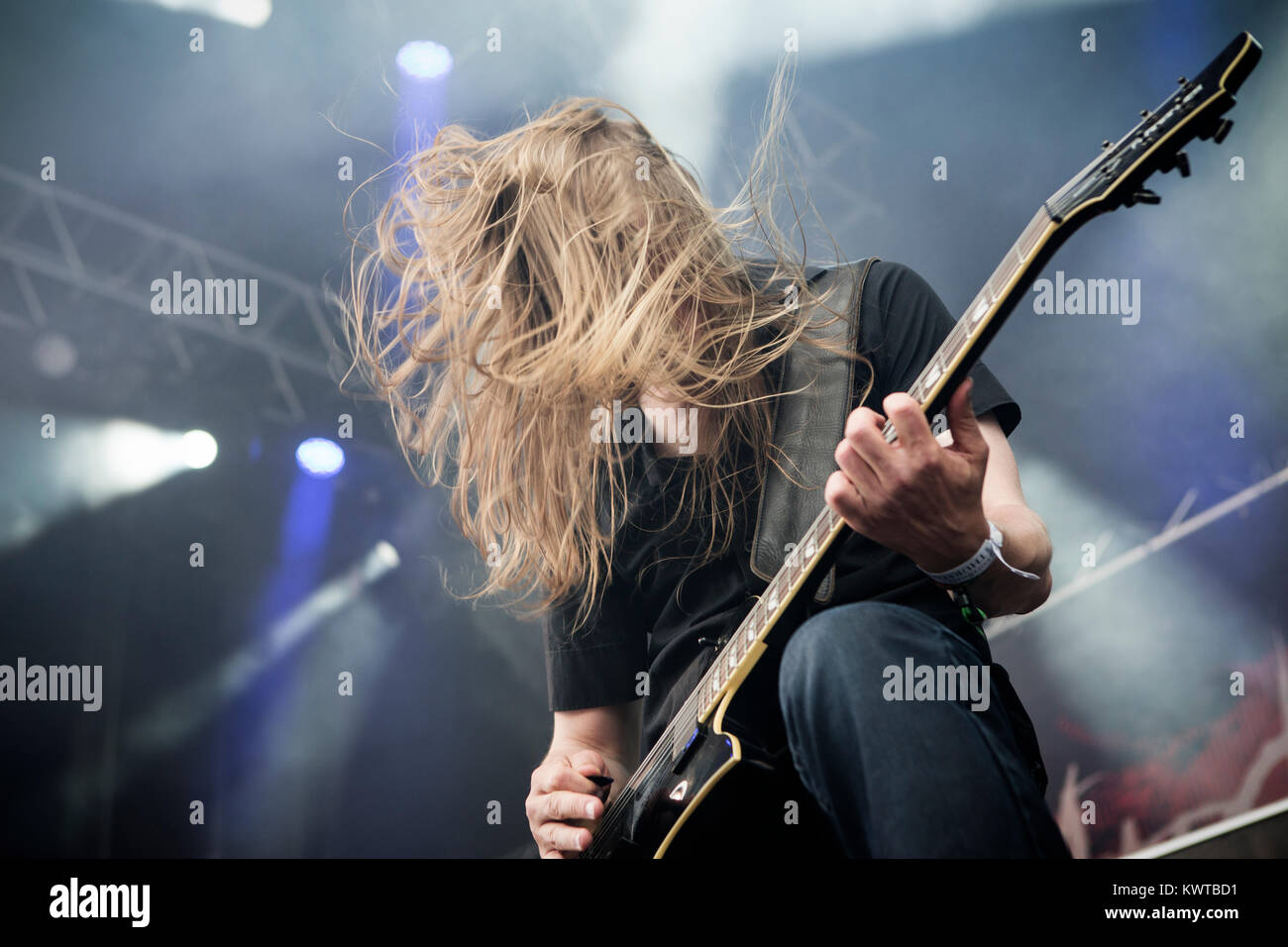 Le groupe de heavy metal danois mercenaire effectue un concert live au festival de heavy metal scandinave Copenhell à Copenhague. Ici le guitariste Jakob Mølbjerg est représenté sur scène. Danemark 12/06 2014. Banque D'Images