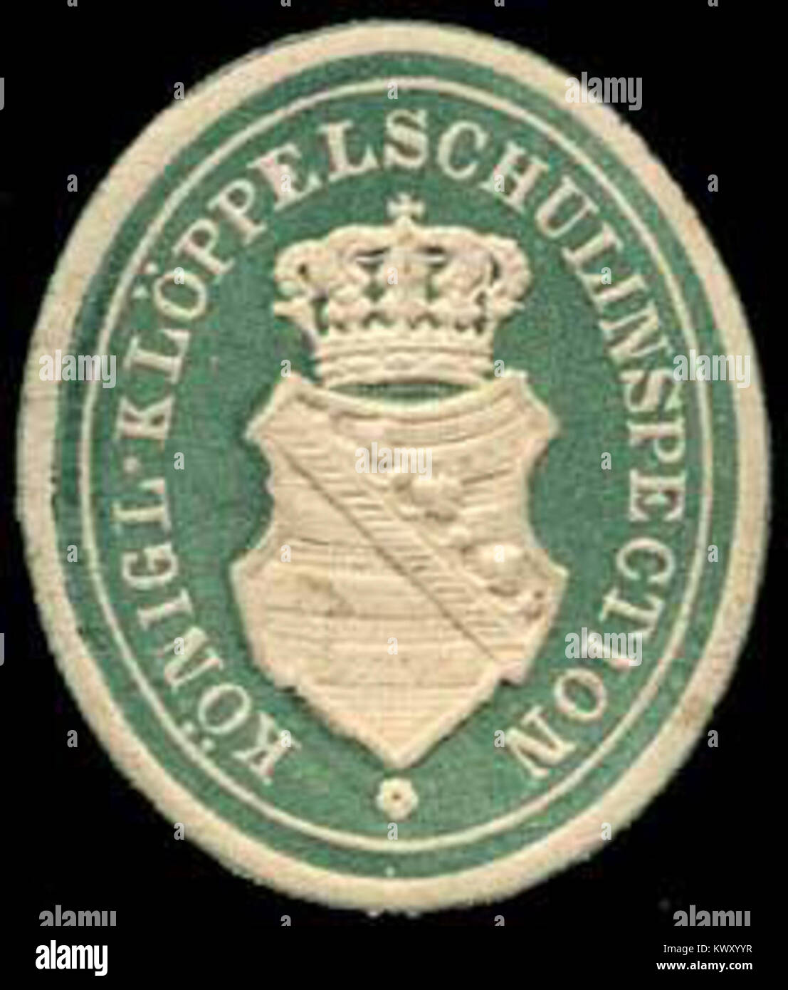 La marque de scellement de la Royal Bobbin-lace School inspection est un sceau officiel adhésif en papier utilisé par l'autorité d'inspection éducative en Allemagne pour authentifier les rapports d'inspection et la correspondance scolaire dans le secteur de la bobine-dentelle. Banque D'Images