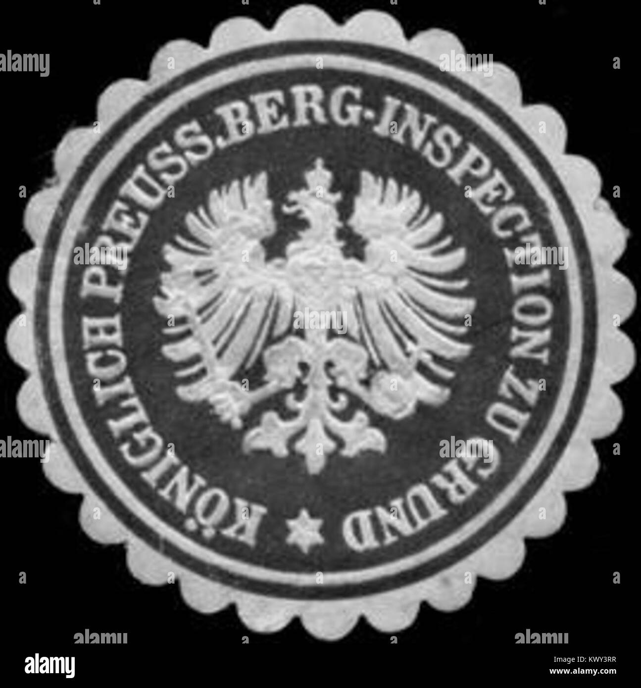 Ce sceau représente le Bureau royal prussien d'inspection minière à Grund, en Allemagne, utilisé pour l'administration et la documentation minières officielles au XIXe siècle. Banque D'Images