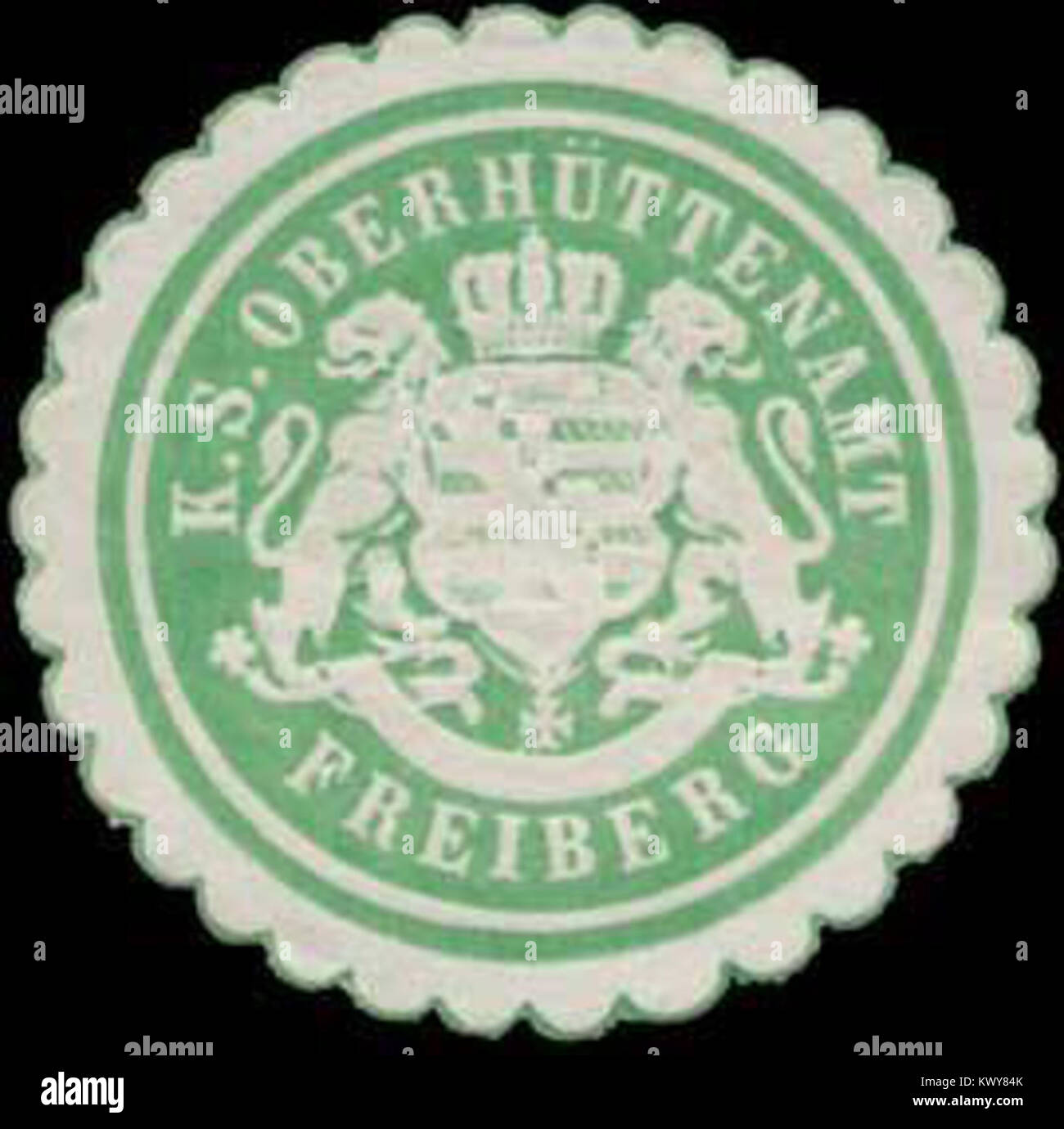 Ce sceau officiel représente le K.S. Oberhüttenamt Freiberg, un bureau administratif clé qui supervise les opérations minières dans la région de Freiberg, reflétant l’importance de l’exploitation minière dans la région. Banque D'Images