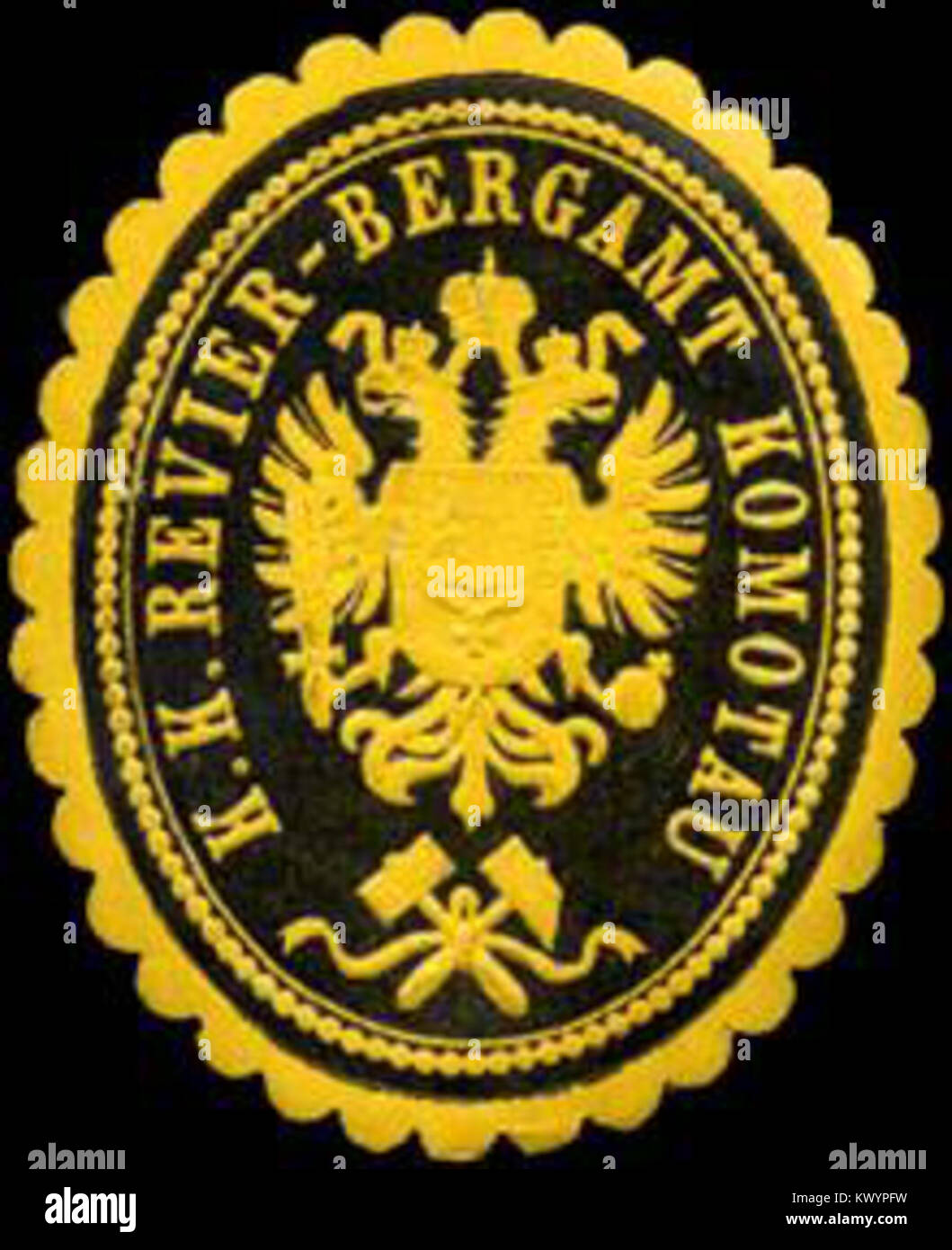 Ce sceau représente le Bureau minier impérial et royal de Komotau, utilisé pour l'administration minière officielle et la documentation dans l'Empire austro-hongrois. Banque D'Images