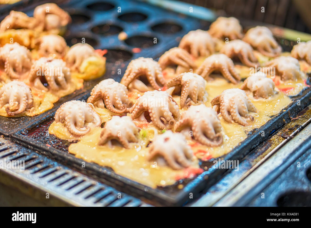 Décisions par Takoyaki big squid marché flottant. Banque D'Images