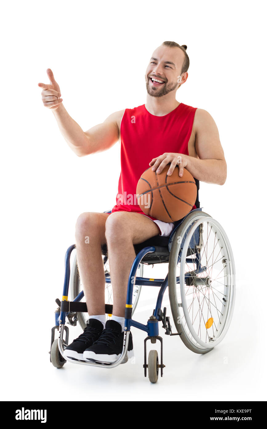 Mobilité sportsman holding basketball ball Banque D'Images