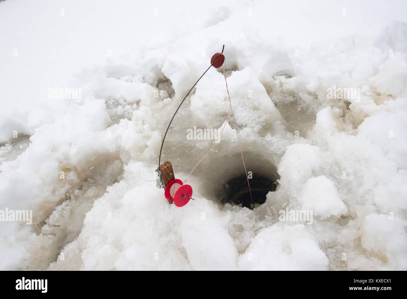 Trou de pêche sur glace en Suède Banque D'Images