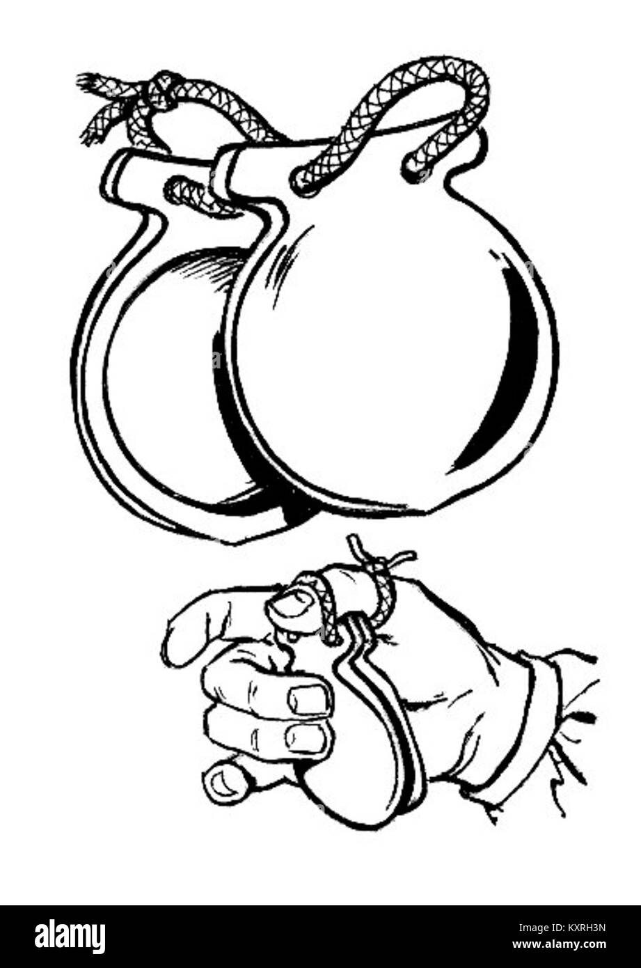 Les castanets sont des instruments de percussion traditionnels couramment utilisés dans la musique et la danse espagnoles, composés de coquilles appariées qui produisent des sons de clics rythmés. Banque D'Images