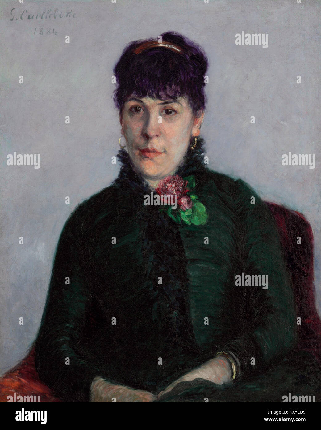 La femme à la rose de Gustave Caillebotte représente une femme assise tenant une rose, illustrant l’attention impressionniste de l’artiste pour la lumière, la texture et les scènes domestiques intimes. Banque D'Images