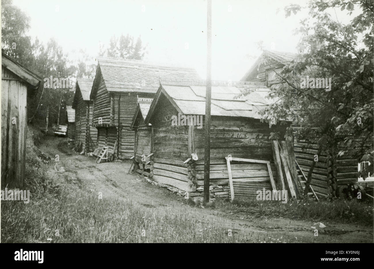 Høkenstad à Oppland, en Norvège, est représenté dans une photographie historique, mettant en évidence son paysage rural, son architecture traditionnelle et son importance culturelle dans le patrimoine norvégien. Banque D'Images