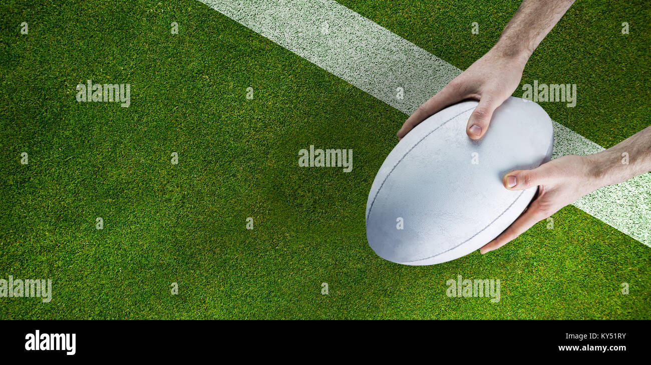 Image composite d'un joueur de rugby qui pose un ballon de rugby Banque D'Images