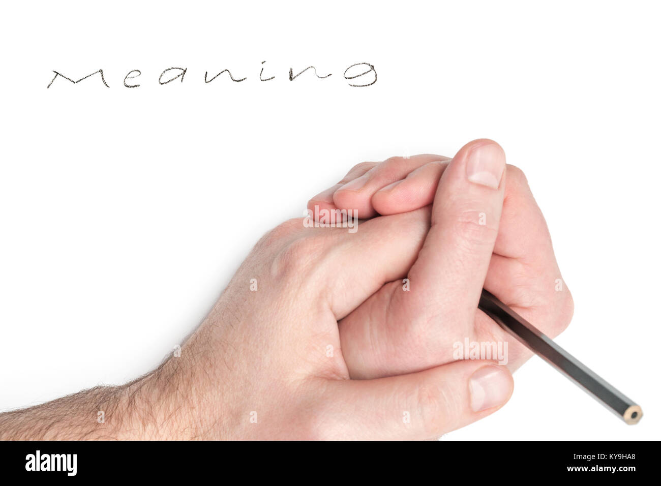 Main dans la main avec un crayon près du mot signifiant, écrits à la main sur une feuille, isolé sur fond blanc Banque D'Images