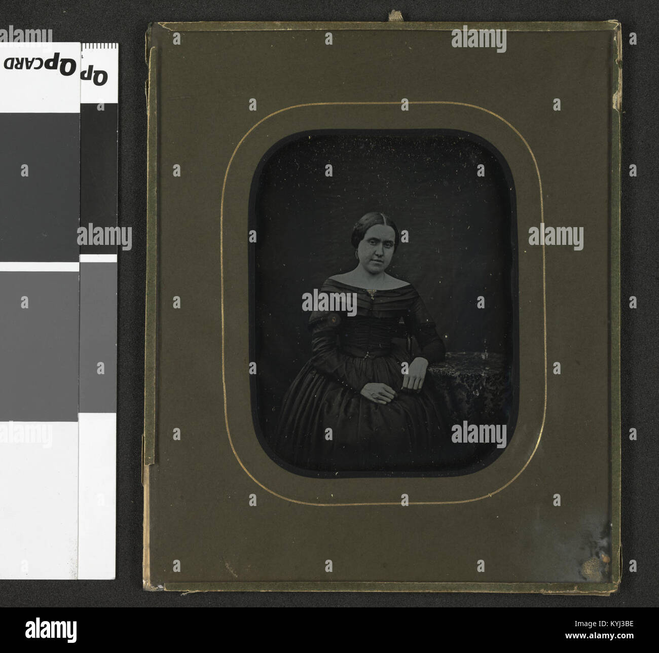 Portrait daguerréotype d'une femme assise de 21 ans, une technique photographique précoce capturant des images détaillées au XIXe siècle. Banque D'Images