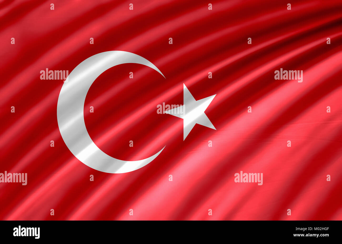 Brandissant le drapeau turc coloré Banque D'Images