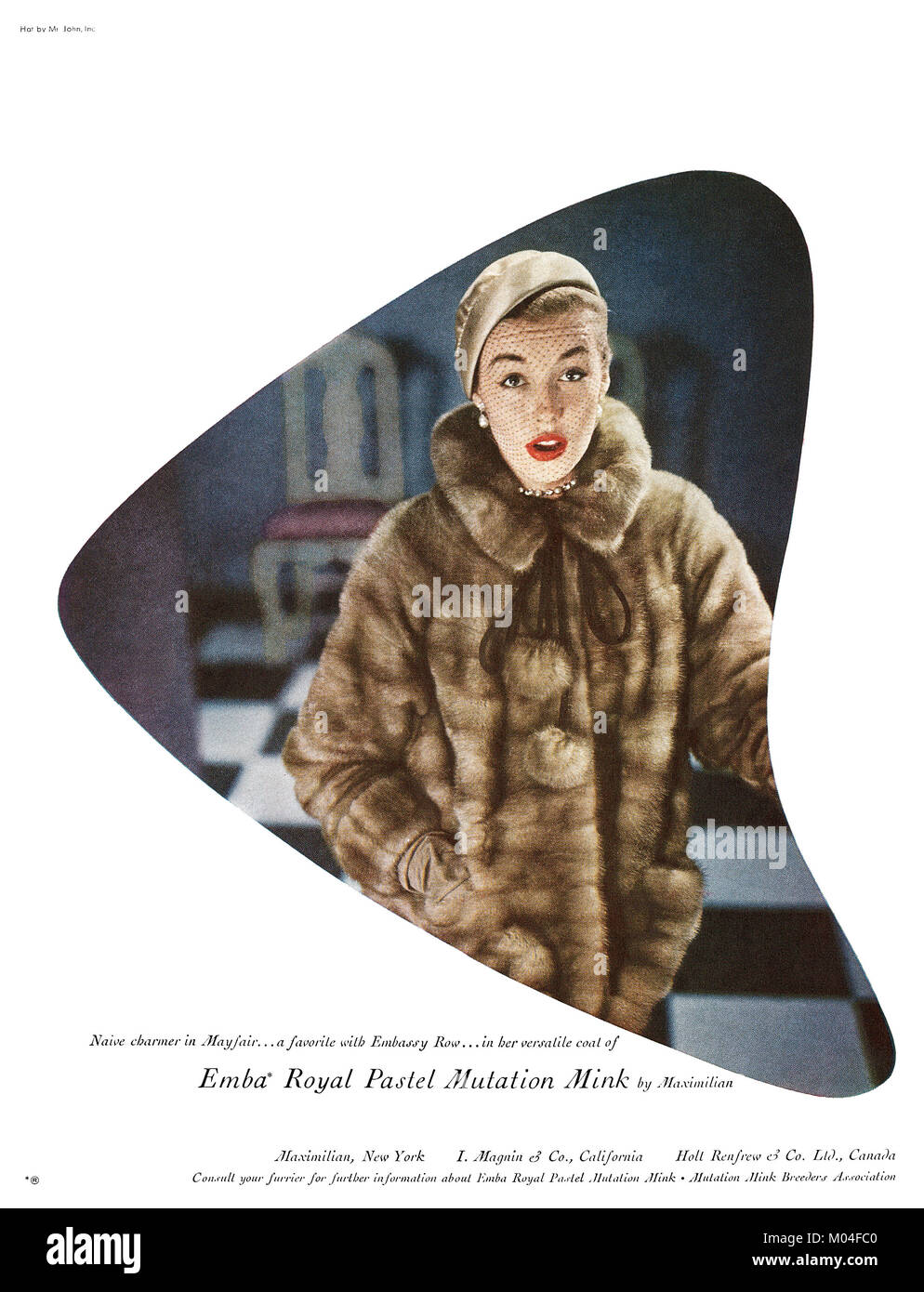 1950 publicité américaine pour la mutation Pastel Emba Mink fur coat par Maximillian, New York. Banque D'Images