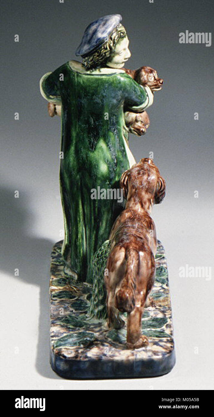 Cette image du Metropolitan Museum of Art montre un garçon portant un groupe de chiots. L'œuvre reflète les thèmes de l'innocence de l'enfance, de la compagnie animale et des relations homme-animal dans compris Banque D'Images
