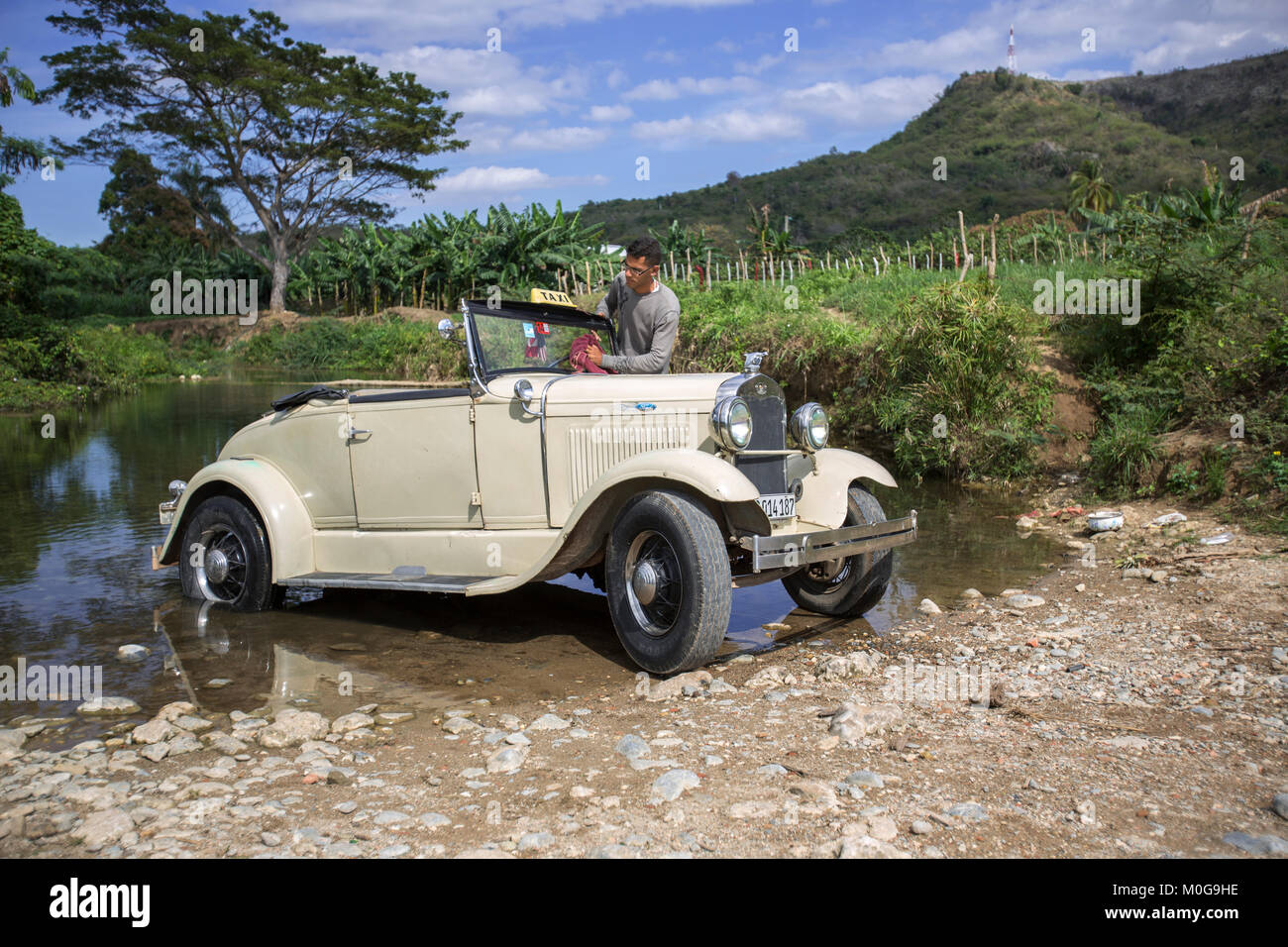 Lave-1928 Ford Modèle une voiture classique à Trinité-river, Cuba Banque D'Images
