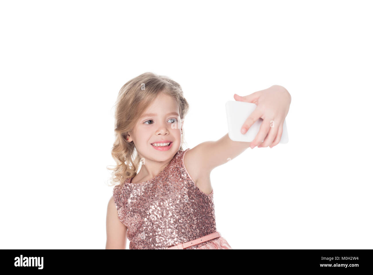 Happy kid en tenant sur smartphone, selfies isolated on white Banque D'Images