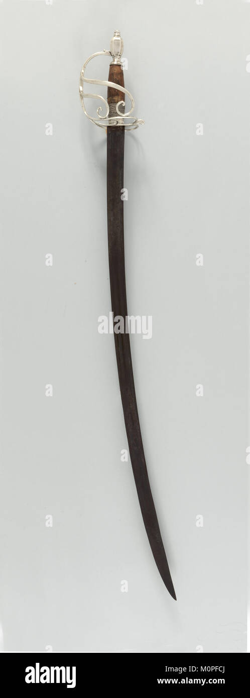 Ce sabre d'officier de cavalerie, une arme militaire historique, présente des éléments de conception complexes et a été utilisé par les officiers au cours du XIXe siècle. Il fait partie de la collection du Metropolitan Museum of Art. Banque D'Images