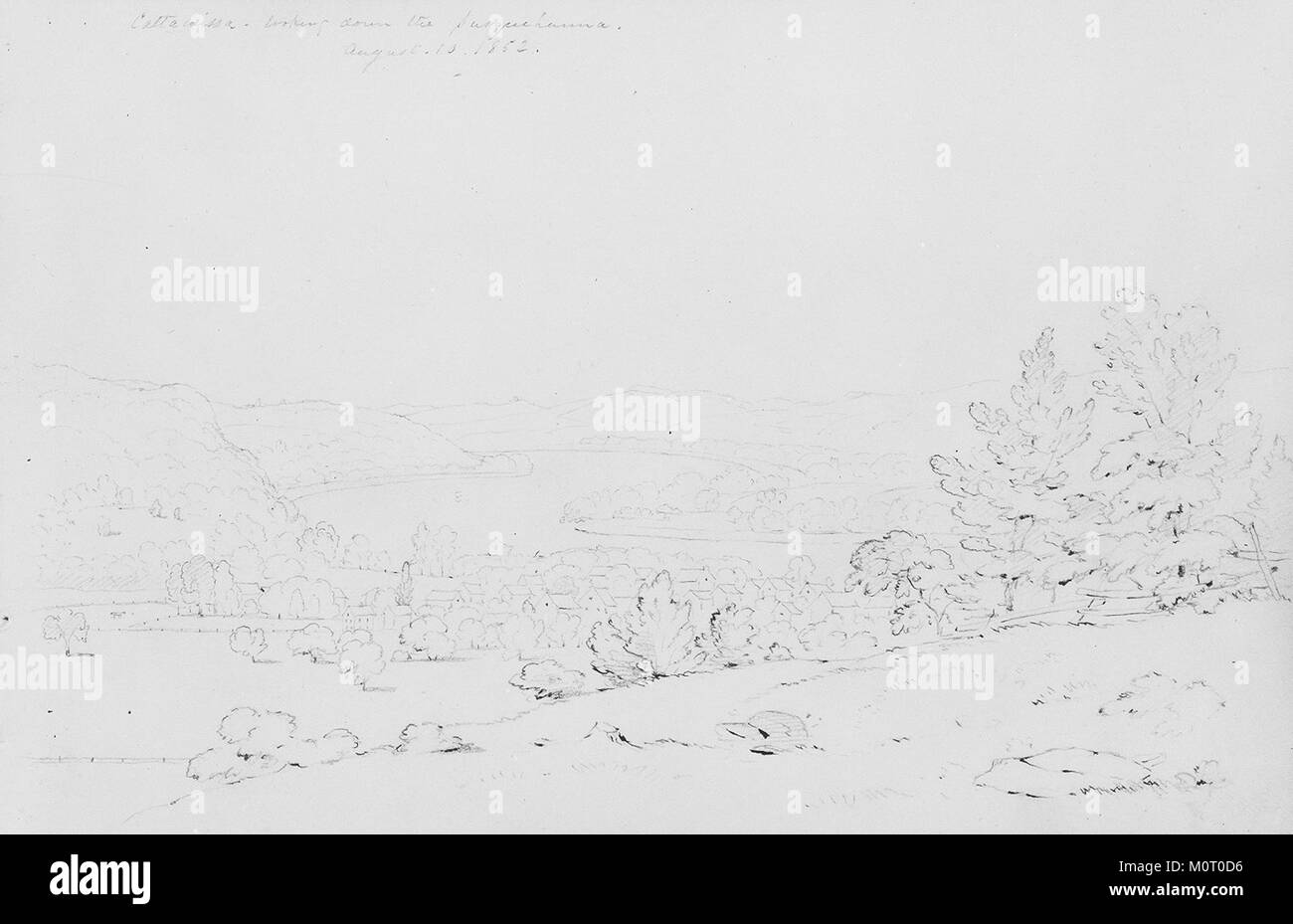 Cette image, intitulée 'Cattawissa, Looking Down the Susquehanna', a été prise dans les années 1970 et représente une vue panoramique de la rivière Susquehanna depuis Cattawissa, en Pennsylvanie. La photographie met en valeur le vaste paysage de la rivière. Banque D'Images