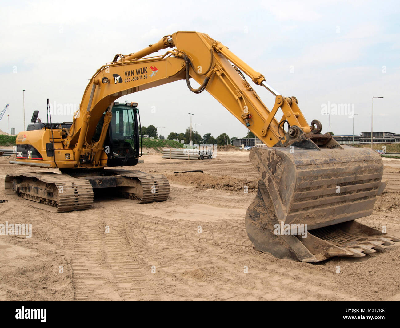 La 320CL Caterpillar est un modèle de pelle hydraulique conçu pour la construction et les opérations minières. Reconnue pour sa durabilité et son efficacité, la 320CL est utilisée pour les travaux d'excavation, de levage et de terrassement. Banque D'Images